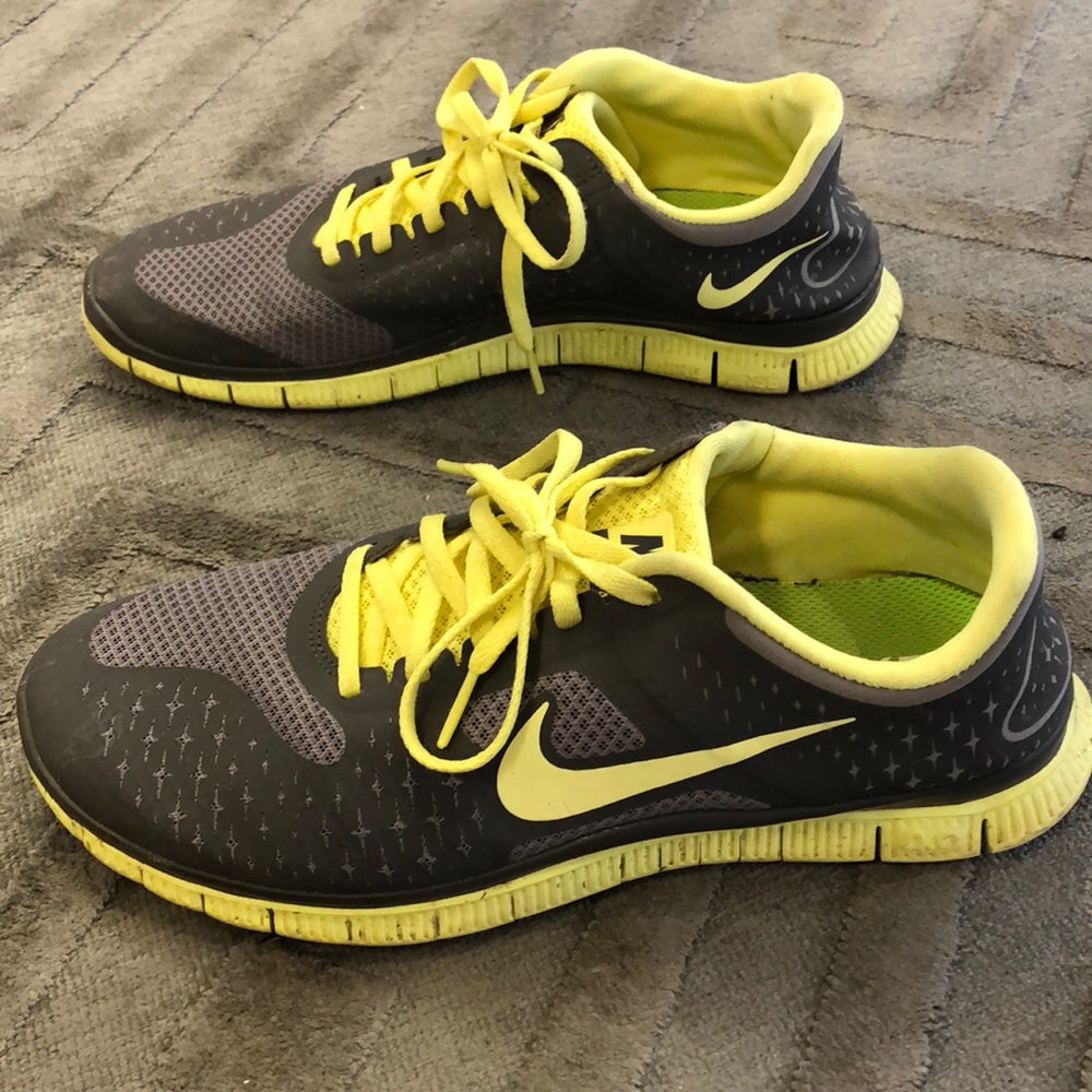 Grey and yellow Nike running sneakers